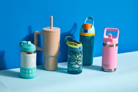a group of kids water bottles