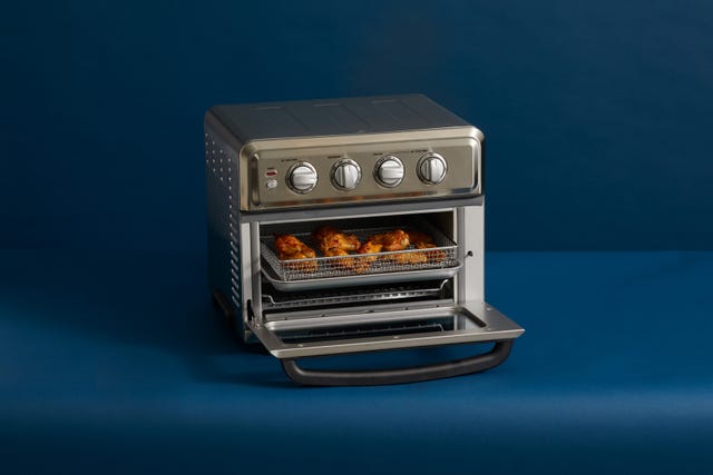 a pizza is cooking in an oven