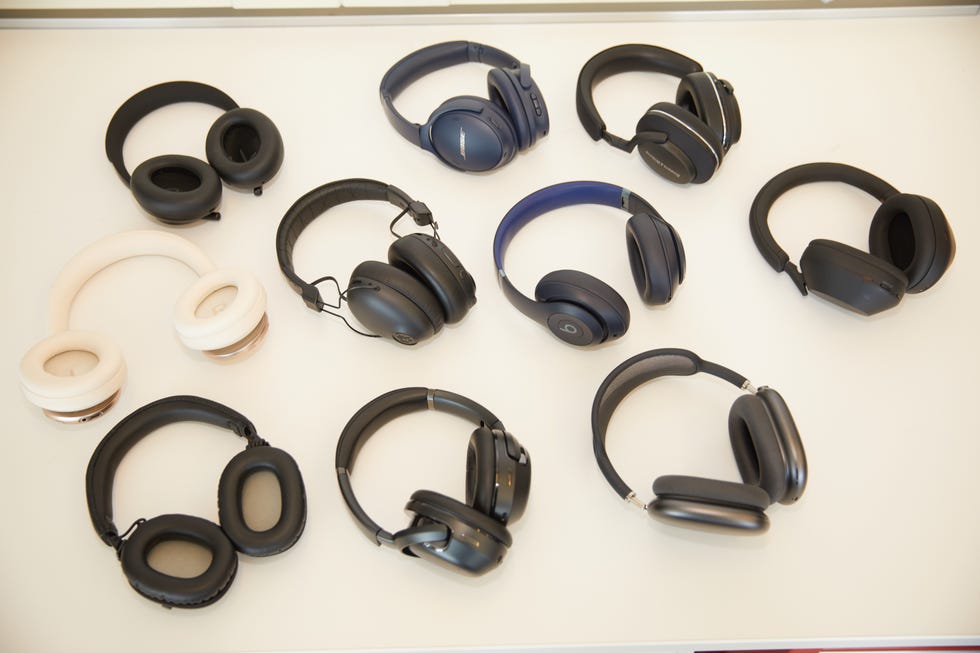 a group of black and white headphones