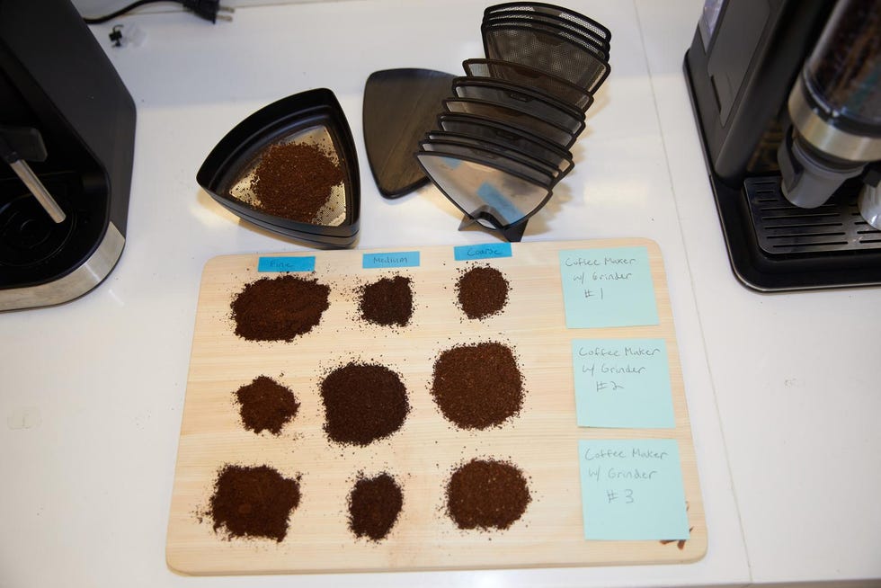coffee sifter with piles of coffee grounds from three different coffee makers with grinders