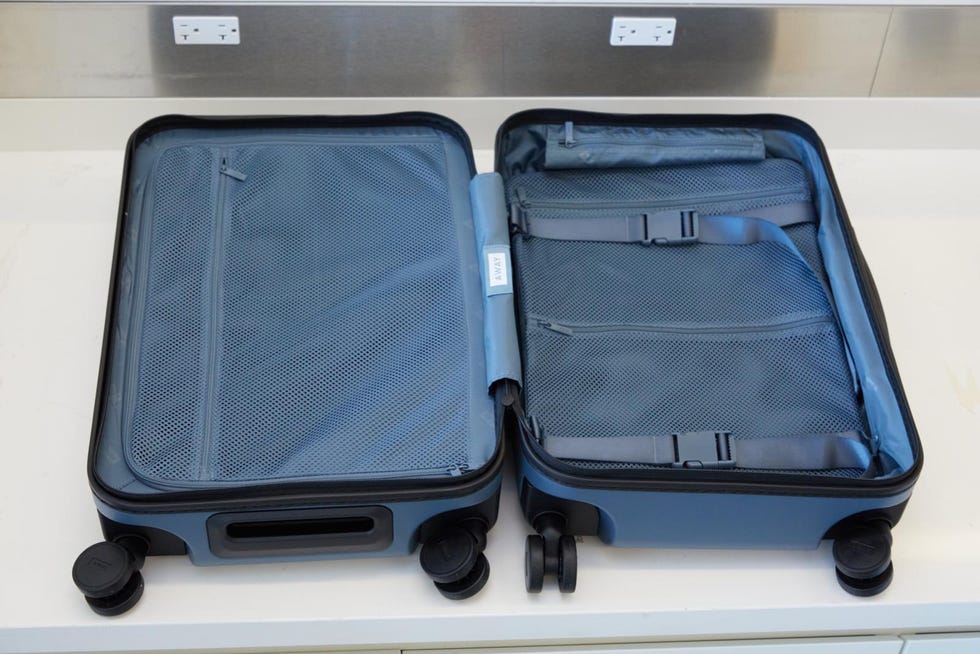 the interior of away carry on suitcase