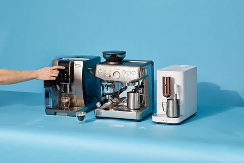 three espresso machine models from ge, breville and delonghi with two shots of espresso made