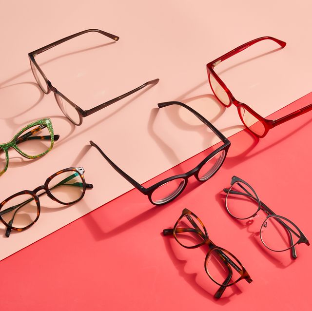 pairs of prescription glasses sitting on a pink table, good housekeeping's picks for the best prescription glasses online
