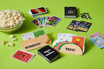 game night setup with cards and popcorn, for a good housekeeping story on the best card games