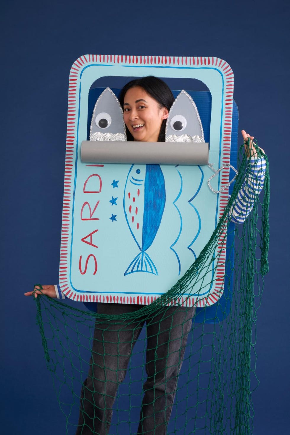 costume resembling a sardine can with a fishing net