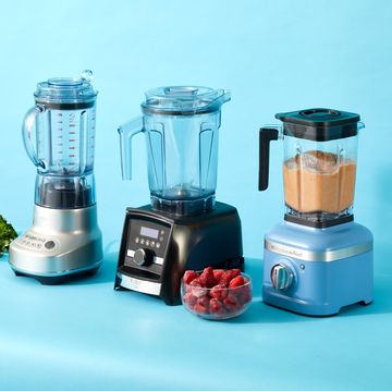 three blenders with smoothie ingredients on the countertop