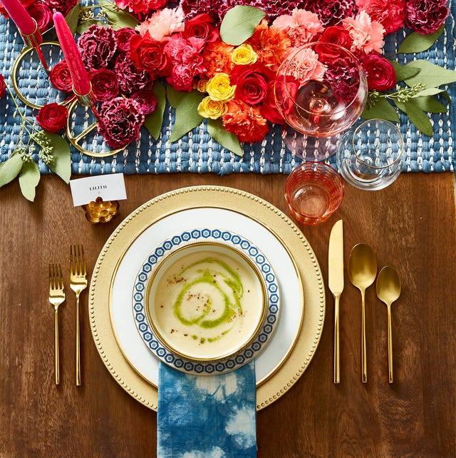 table setting with blue woven runner and carnation centerpiece table setting with blue woven runner and carnation centerpiece