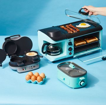 breakfast stations with fried egg, bacon, toast and eggs