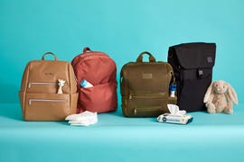 best backpack diaper bags for parents, showing bags from itzy ritzy, state, dagne dover and huhu, for a good housekeeping institute list of the best baby backpack diaper bags