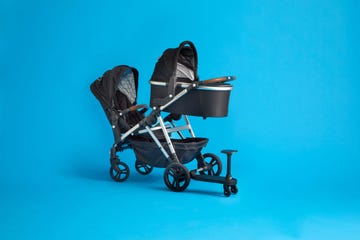 a mockingbird single to double stroller shown configured for three children thanks to an additional riding board, part of a good housekeeping review of the mockingbird strollers