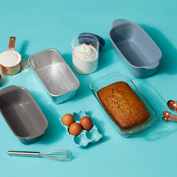 four loaf pans with banana bread ingredients
