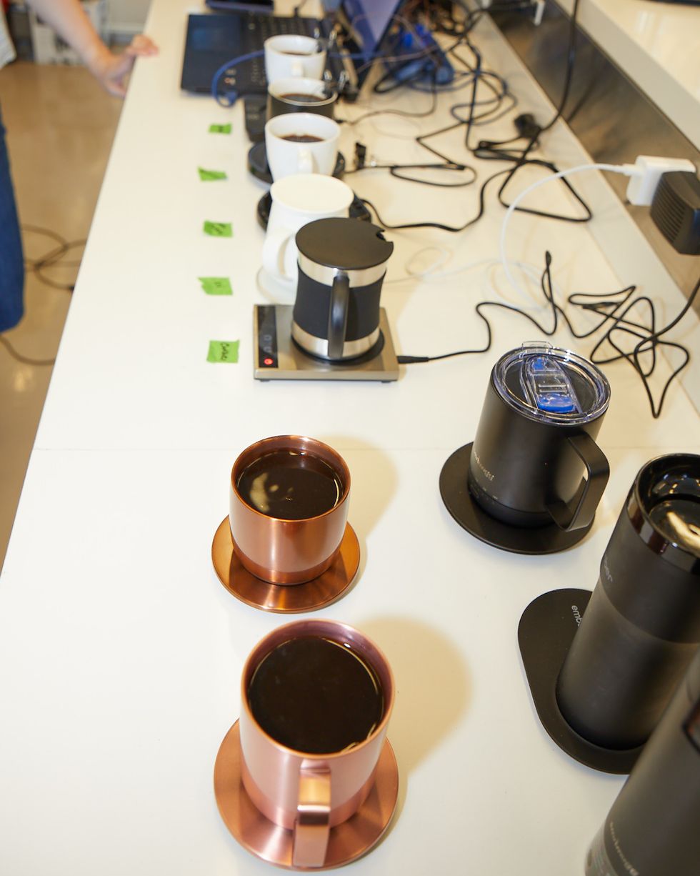 a shot of three ember mugs during heated mug testing in the lab
