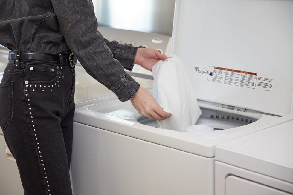 constantine washing white tshirts in the textiles lab