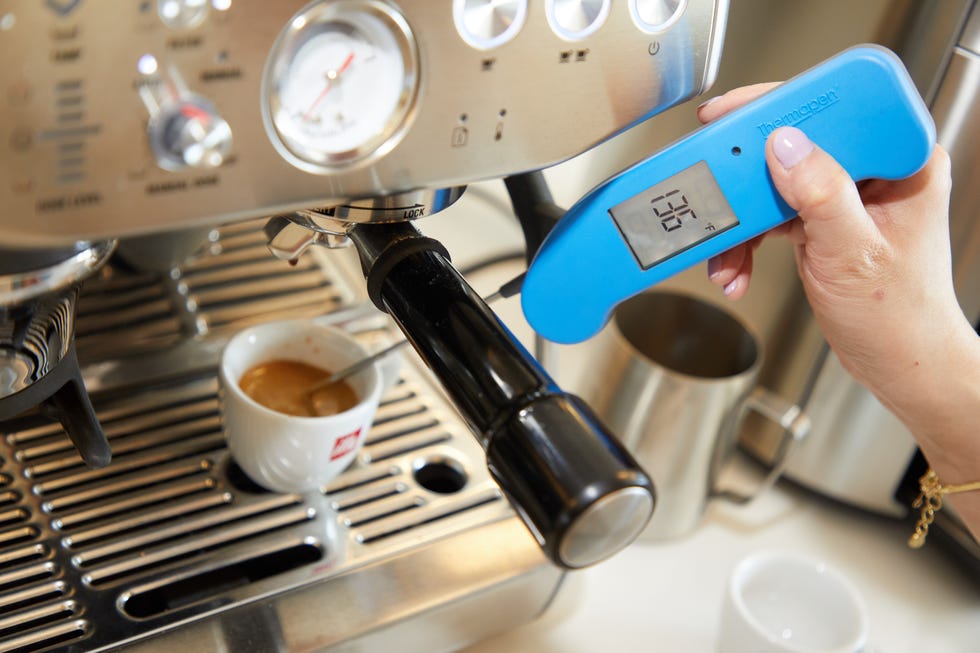 taking the temperature of a shot of espresso