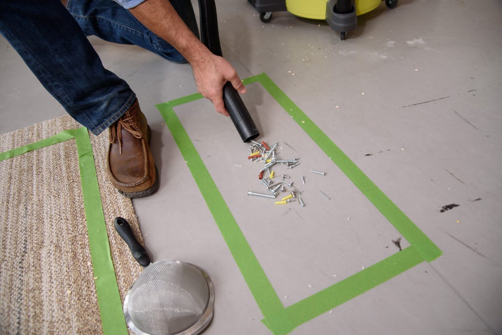 a good housekeeping institute expert suck up nails, screws and other hardware as part of shop vac test