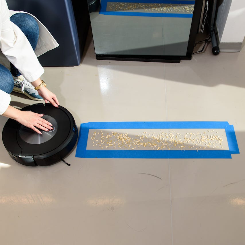 analyst testing self-empty robot vacuum analyst testing self empty robot vacuum