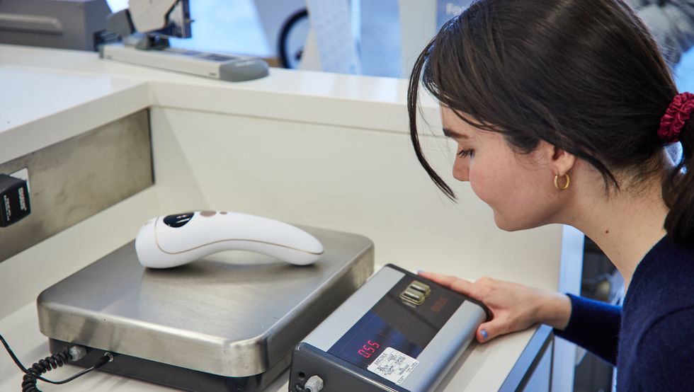 a lab analyst testing at home laser hair removal devices in the good housekeeping institute beauty lab