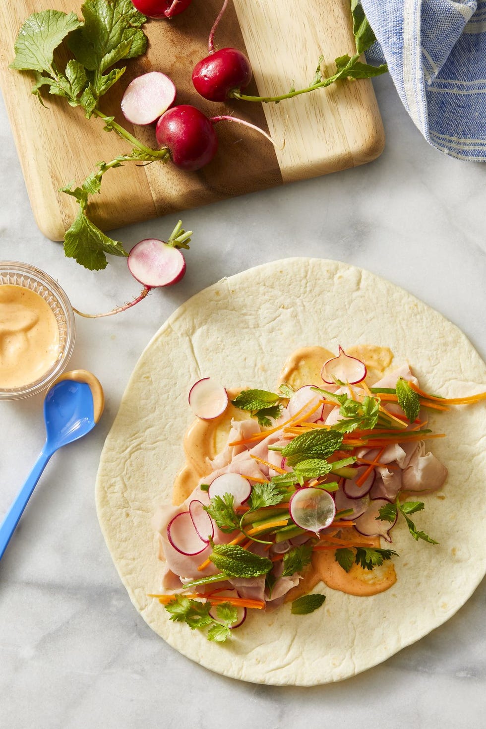 spicy bánh mì wraps with sliced radish