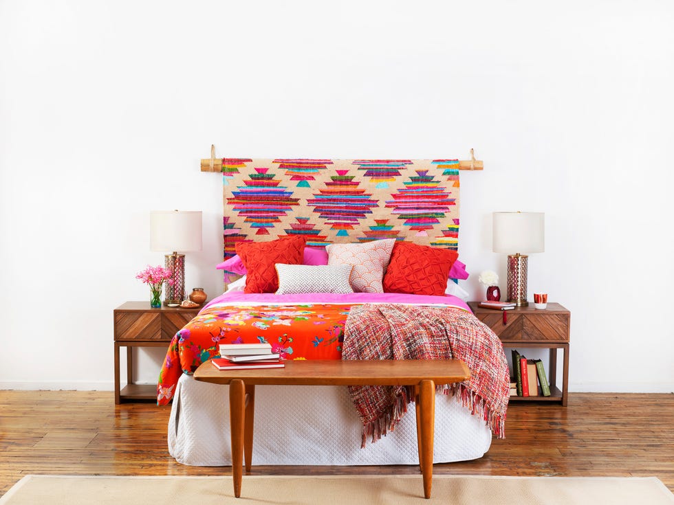 boho bedroom with tapestry headboard