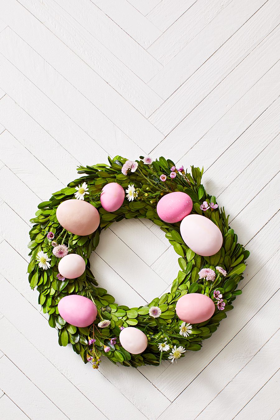 boxwood wreath with eggs and flowers easter craft
