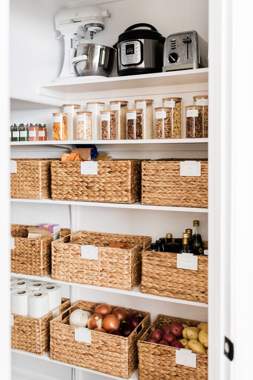 hide pantry items in matching baskets organized pantry, labels, spice jars, woven storage baskets, organizational pieces