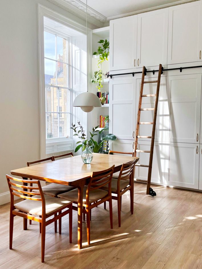 Wooden dining table with glass in online the middle