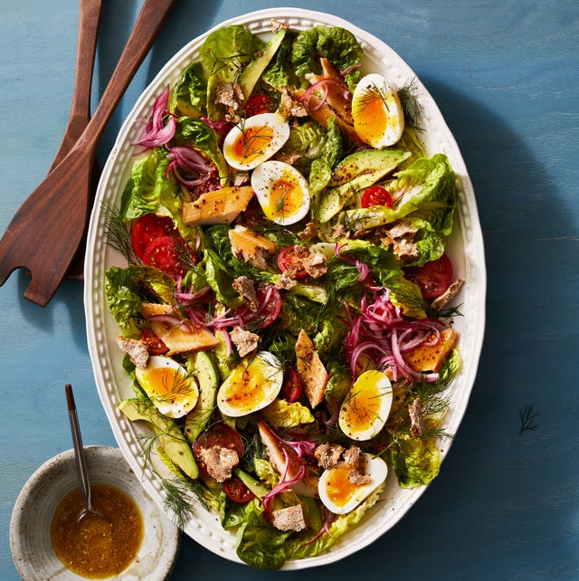 smoked trout salad smoked trout salad boiled eggs, onions, sliced avocados and tomatoes seafood