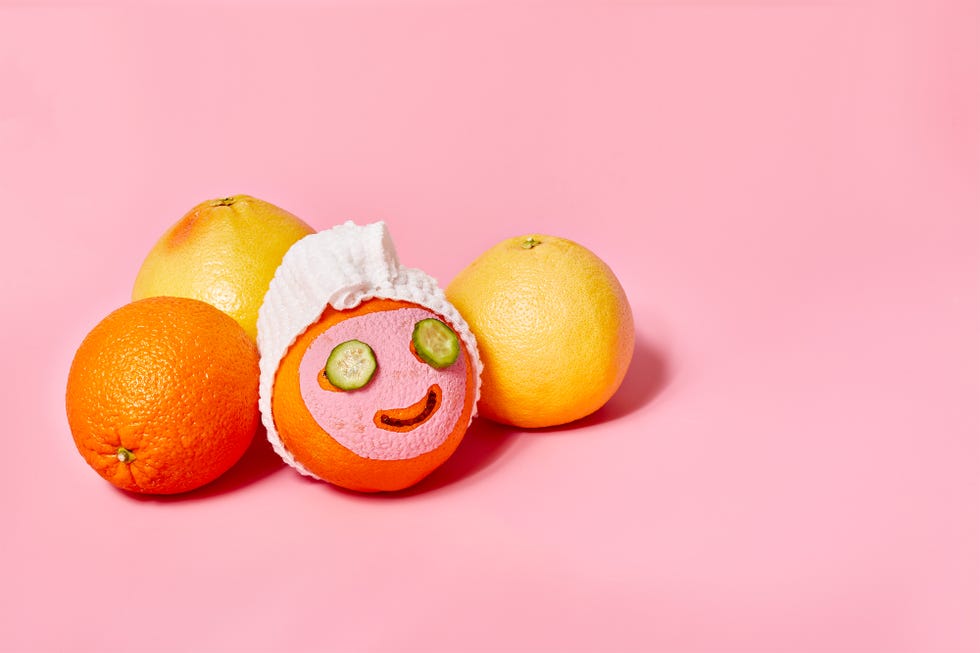 oranges with face masks