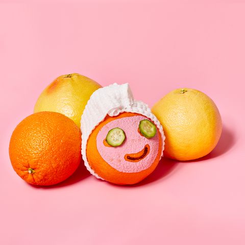 oranges with face masks