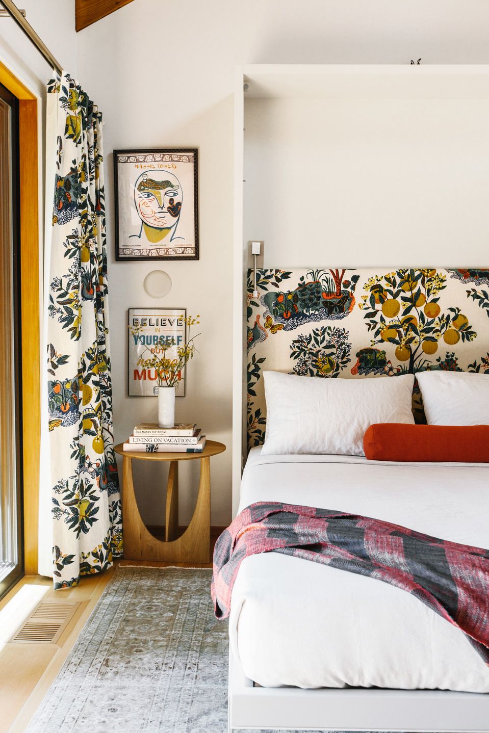 bedroom with bright citrus wallpaper