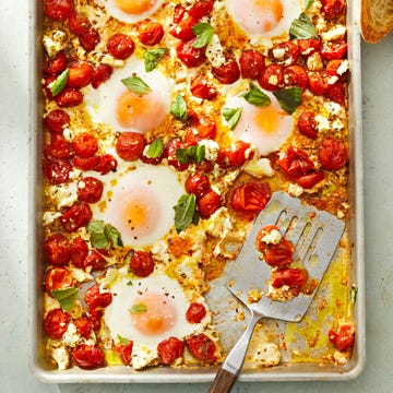 Tomato and Feta Baked Eggs tomato and feta baked eggs on a sheet pan