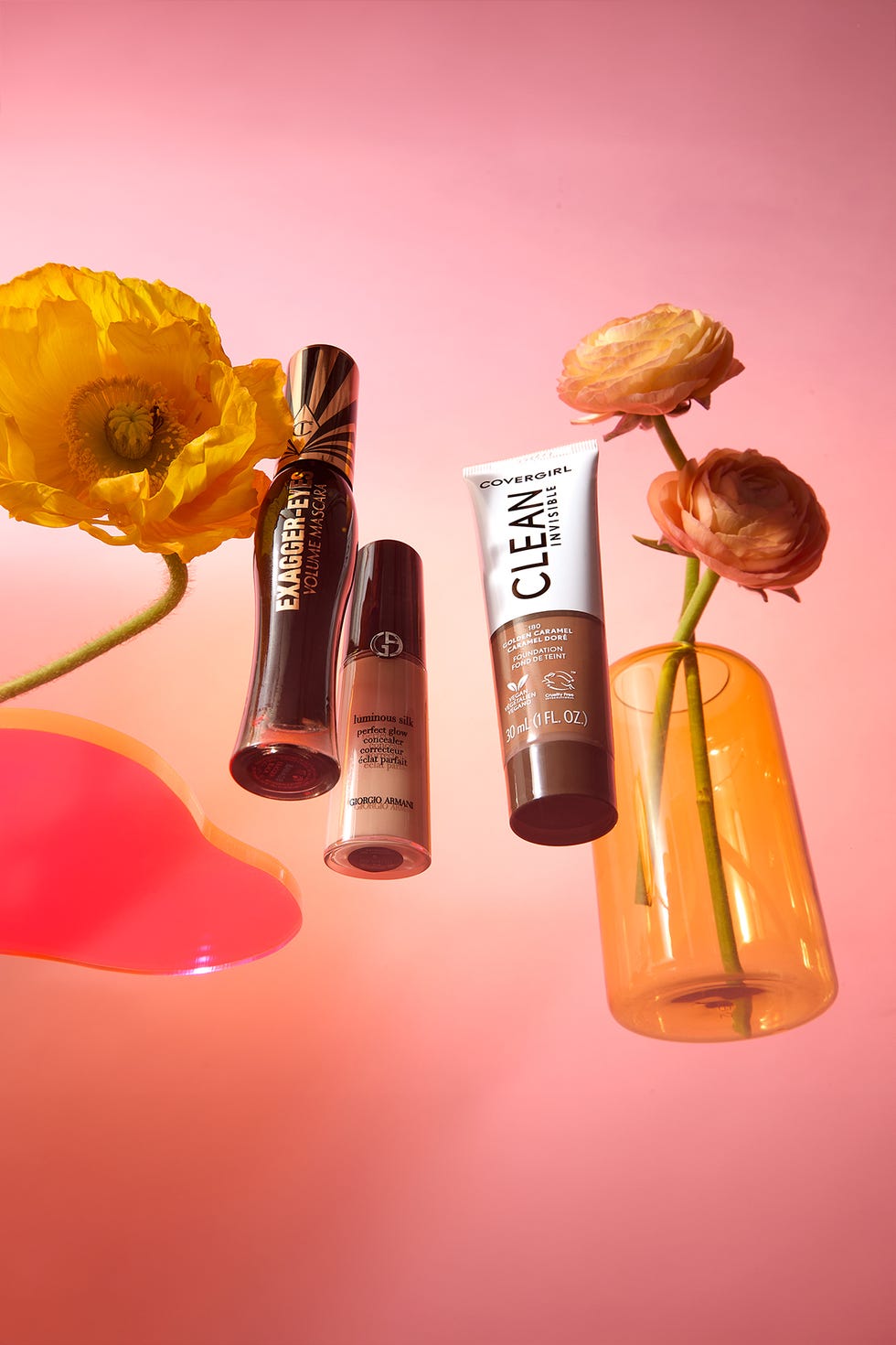 charlotte tilbury exagger eyes volume mascara, covergirl clean invisible foundation and armani beauty luminous silk concealer