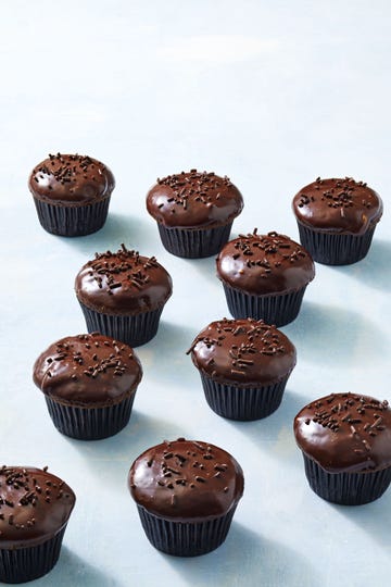 chocolate cupcakes with ganache glaze. desserts.