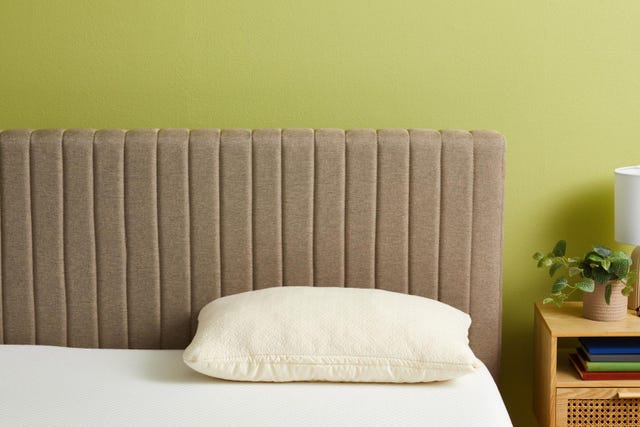 naturepedic organic adjustable latex pillow on a bed