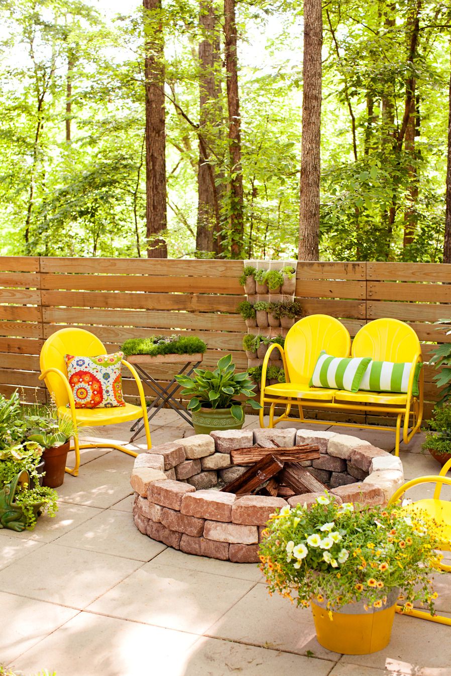outdoor living space, patio, deck, backyard, firepit, yellow chairs