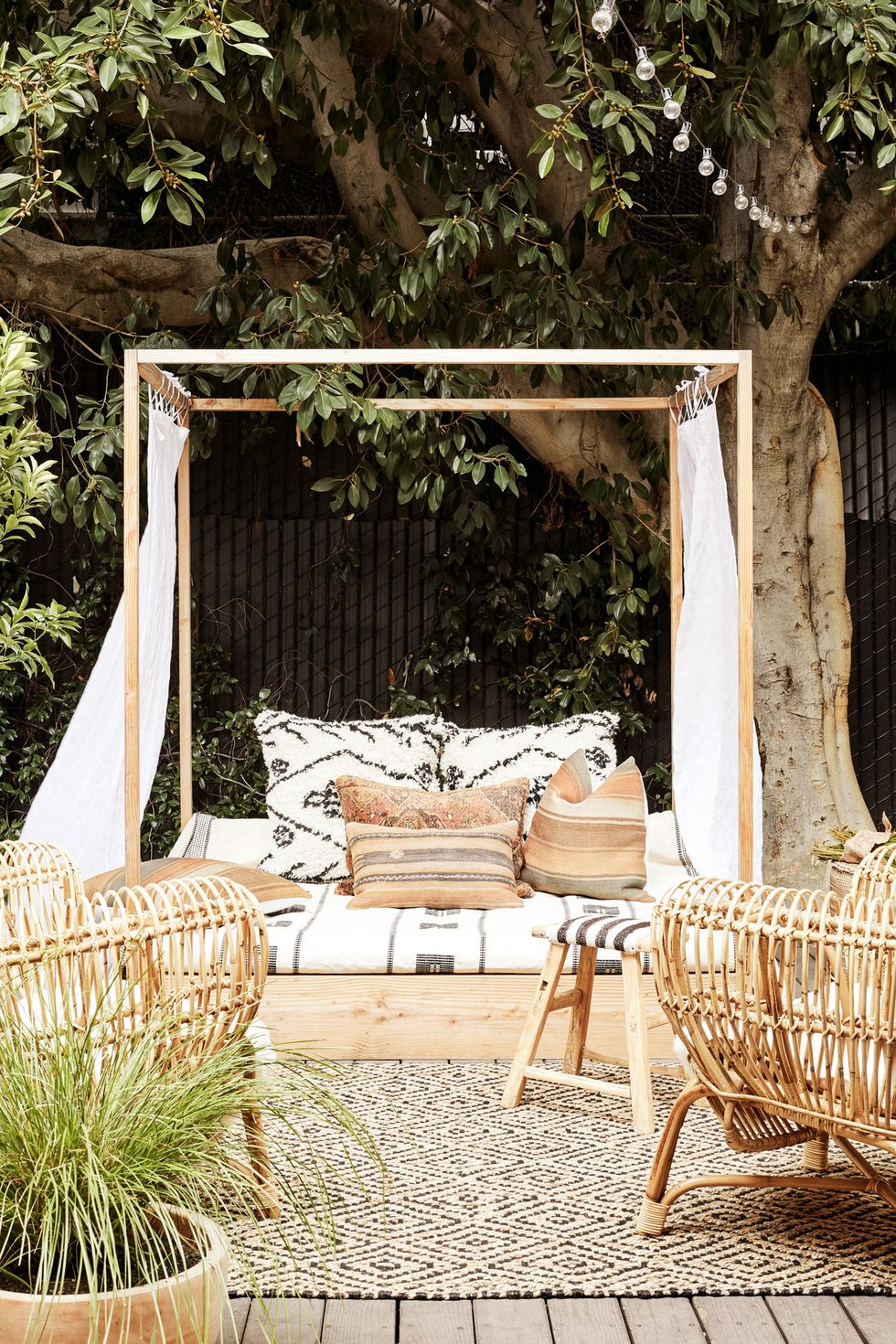outdoor living space, patio, deck, backyard, outdoor bed, canopy bed in garden
