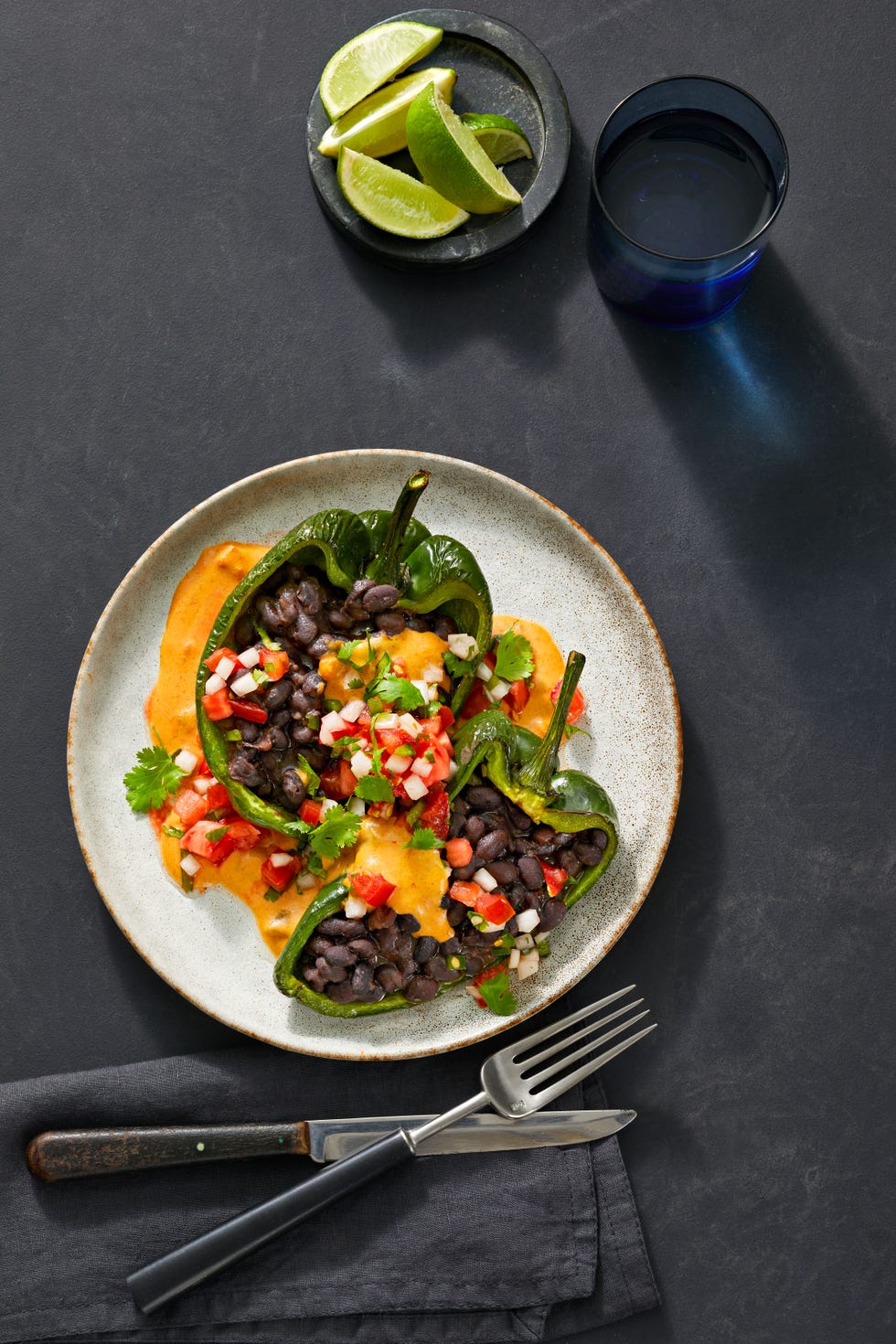 black bean stuﬀed poblano peppers with queso