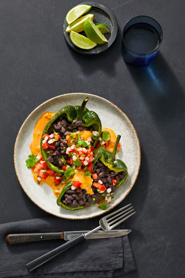 black bean stuﬀed poblano peppers with queso