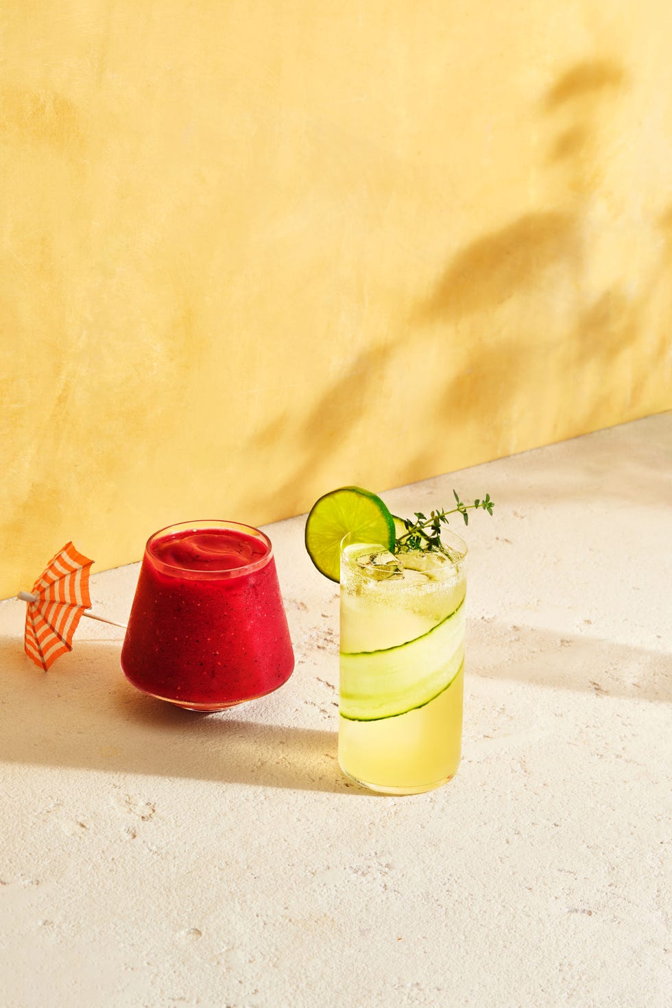 pick cocktails tropical frose with a cocktail umbrella on the side