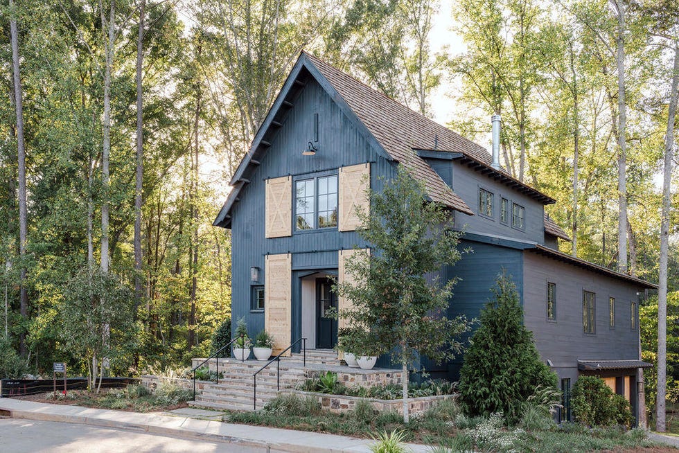 serenbe house with trees around it
