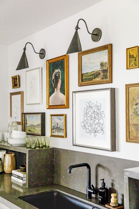 house of jade interiors gallery wall, mix of art and printed items kitchen