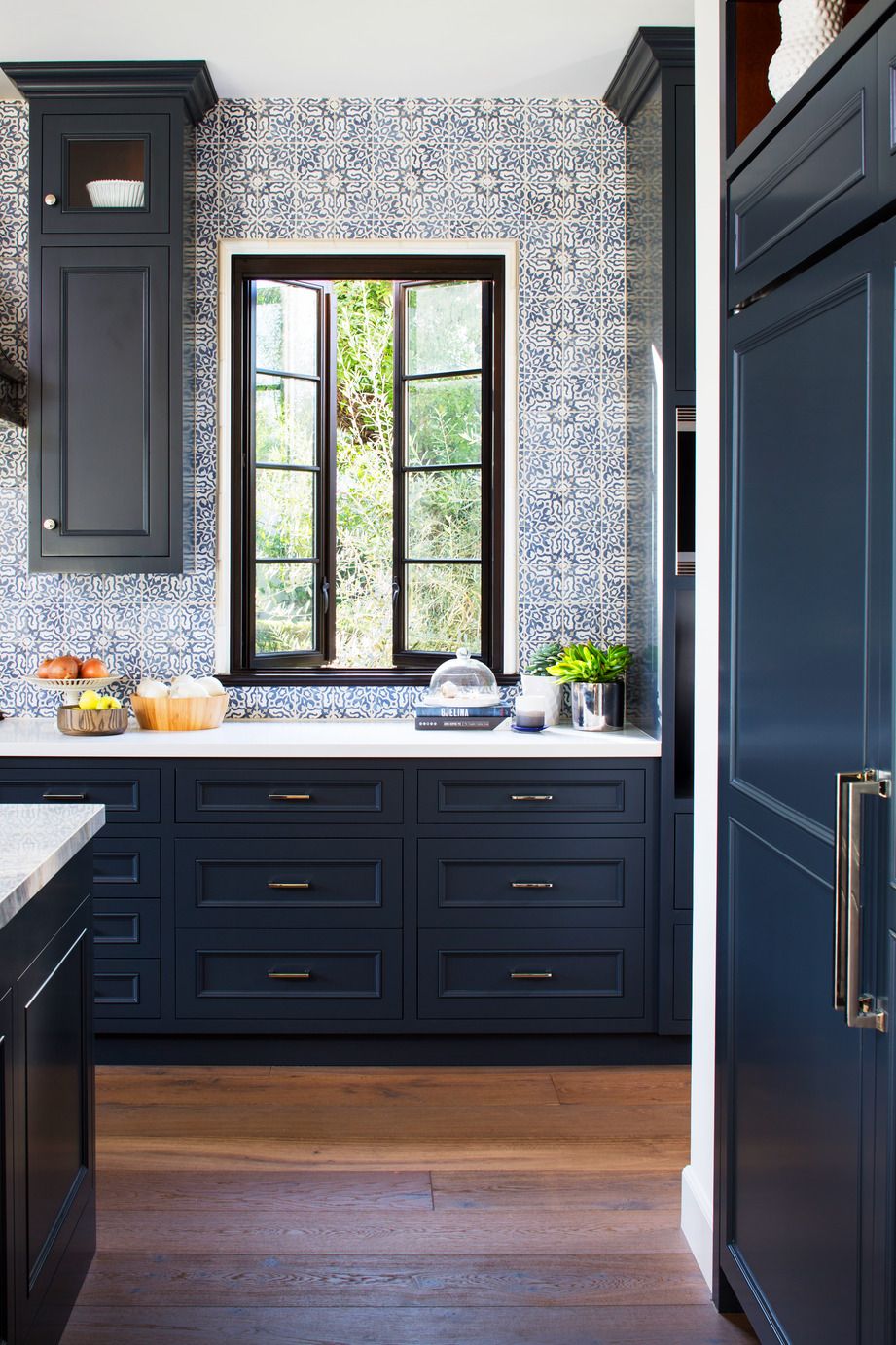 kitchen backsplash, blue and white tile backsplash, ceramic tiles, navy blue cabinets, white countertop