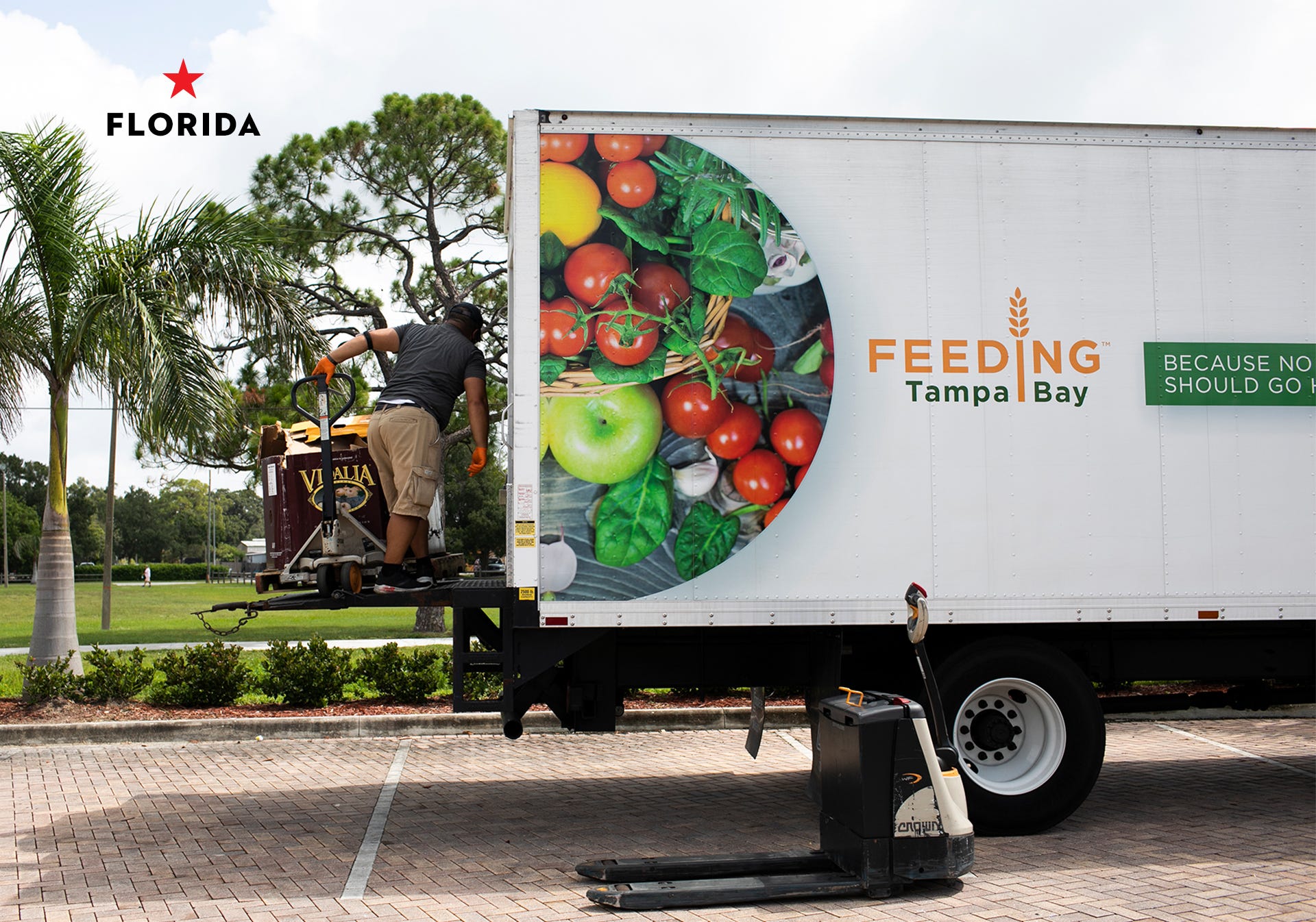 a feeding tampa bay truck at a distribution site with feeding tampa bay in pinellas park, florida on july 10, 2020 feeding tampa bay provides 10 counties in the area with their services