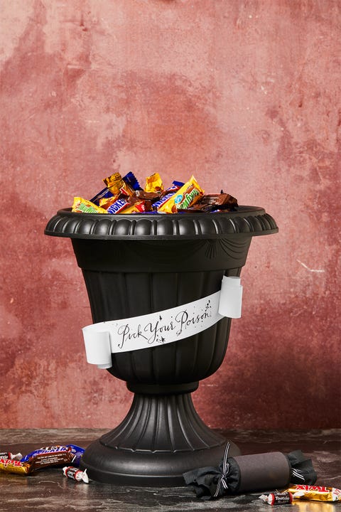 halloween party ideas, black cauldron with candy inside