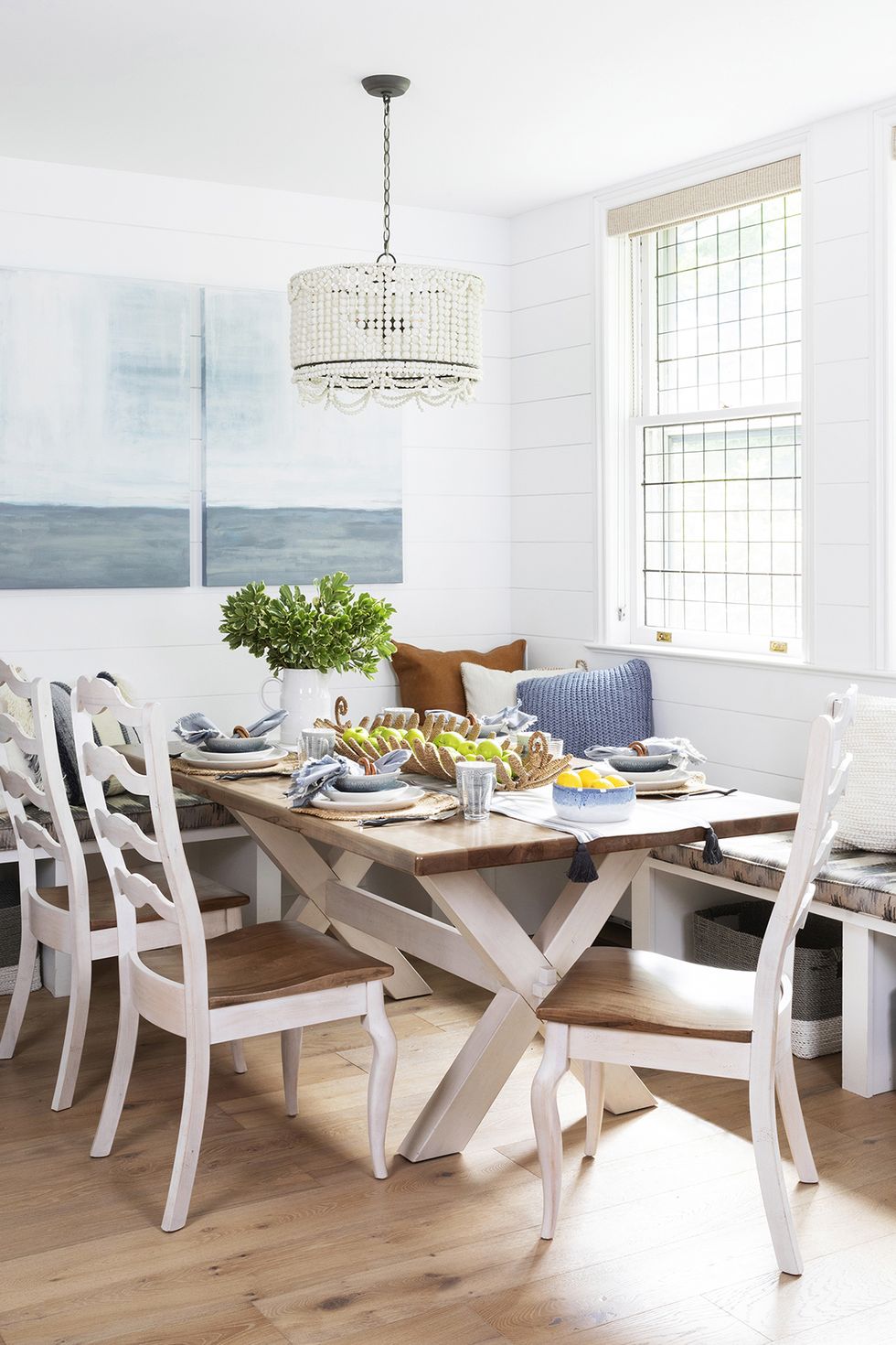 home featuring warm neutrals and soothing blue hues to accent the beautiful architecture of the vintage home interior designer karen b wolf dining room, breakfast nook