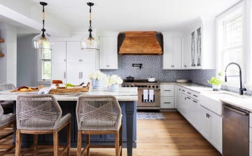 home featuring warm neutrals and soothing blue hues to accent the beautiful architecture of the vintage home interior designer karen b wolf kitchen