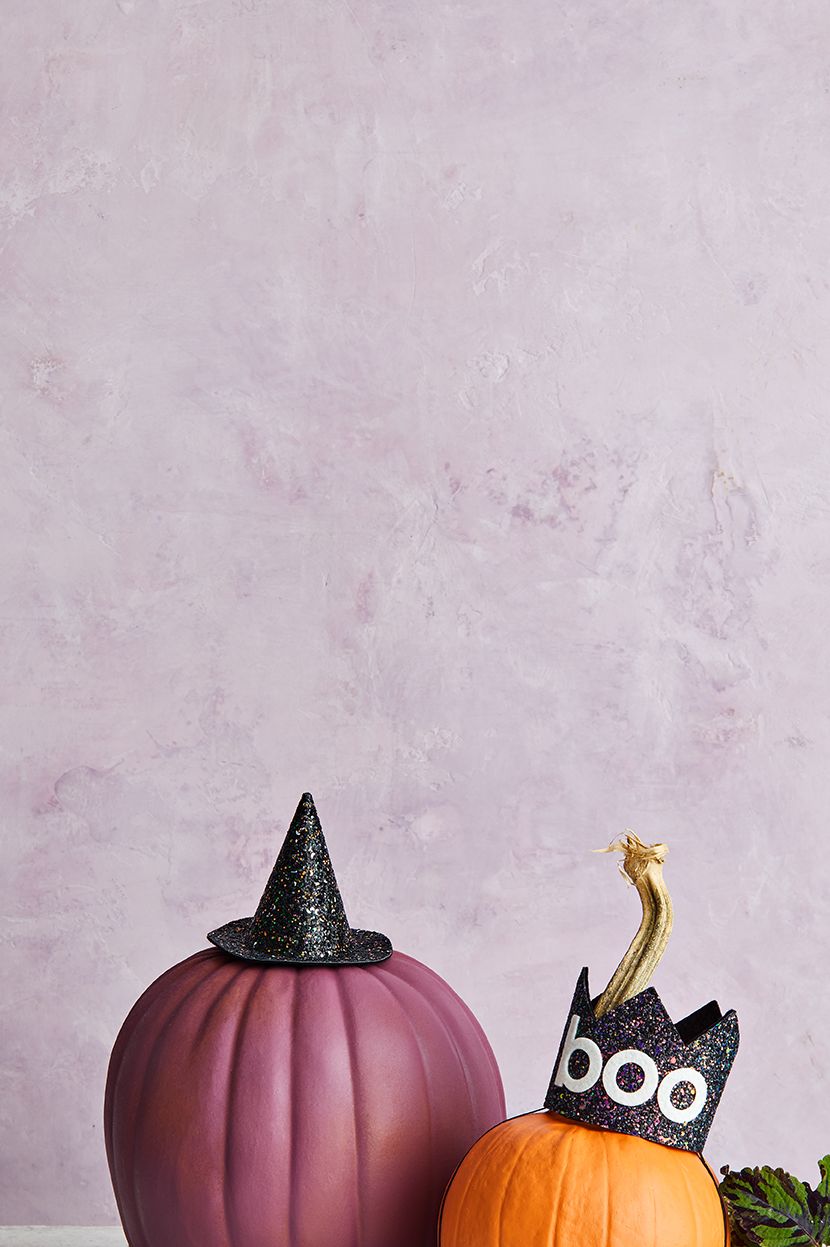 pumpkin topped with witch hat