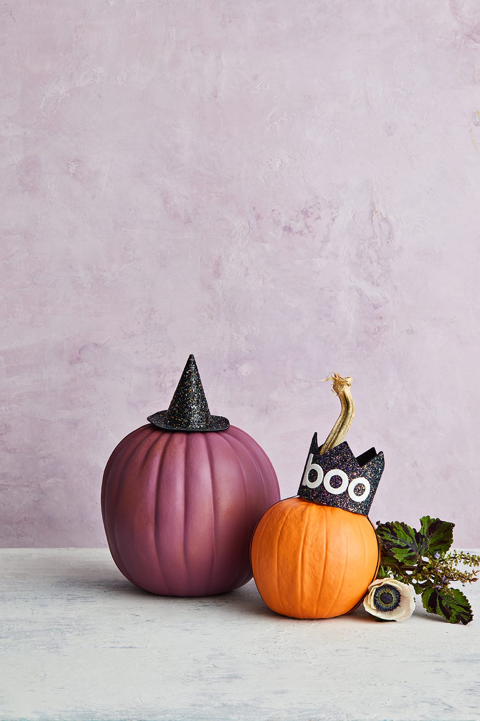 pumpkin topped with witch hat