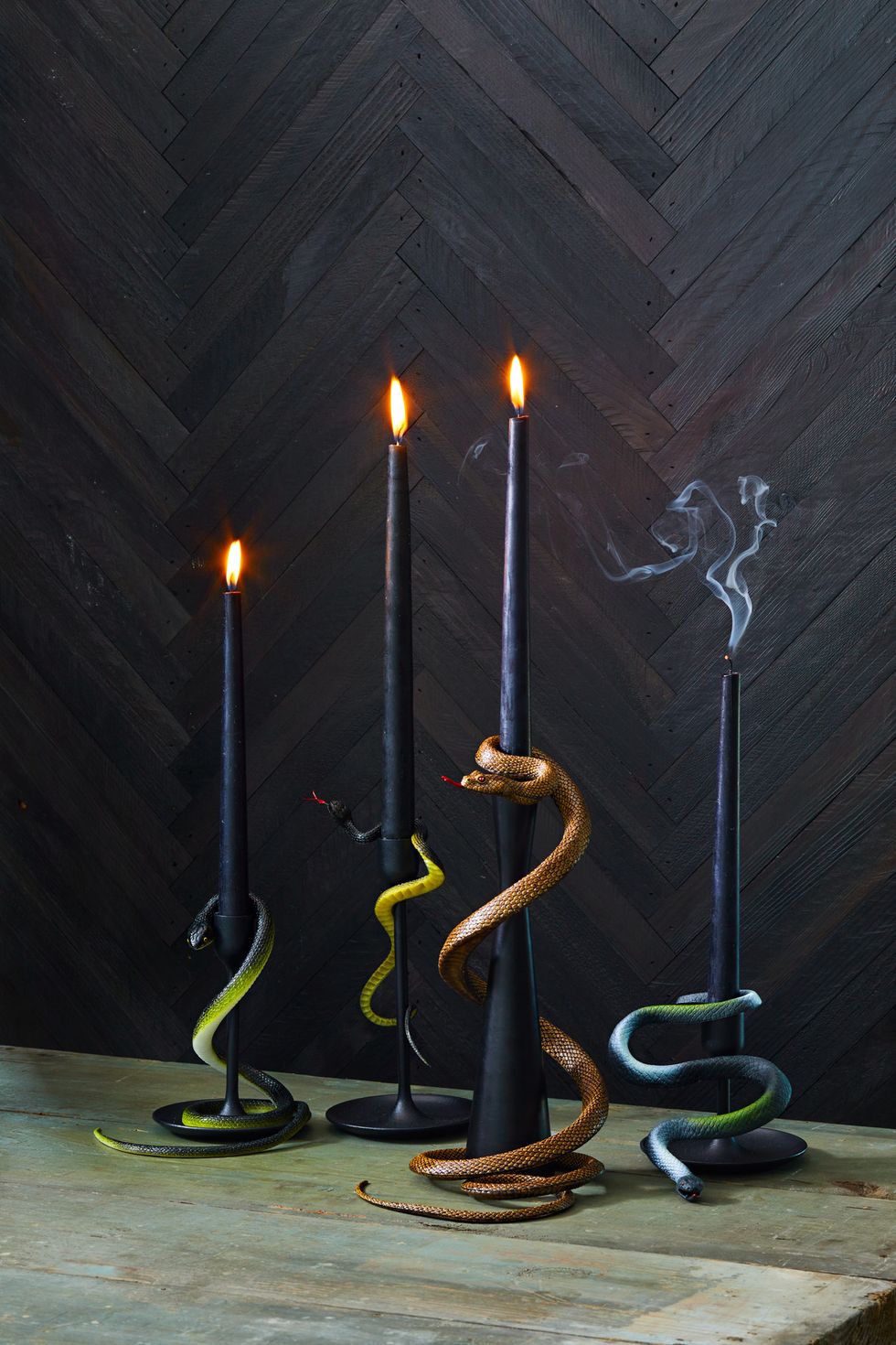 diy halloween decor slither smoke candles black candlesticks with wrapped with plastic toy snakes spooky season