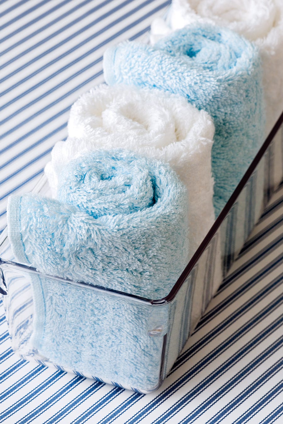 washcloths in plastic bin